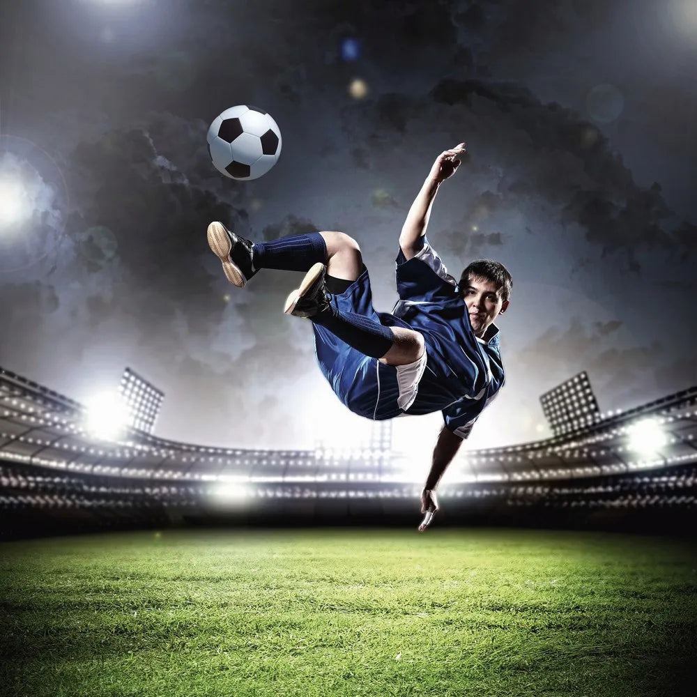 Football player kicks a ball