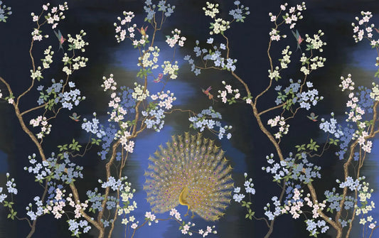 Peacock in flowering trees