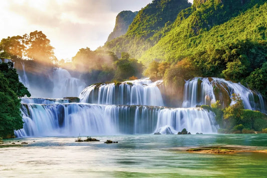 The cascade of waterfalls in the mountains